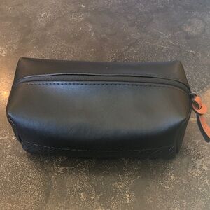 Cole Haan Black Leather Toiletry Kit with travel essentials